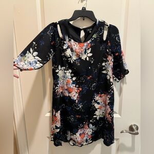 Black mini dress with peekaboo shoulders